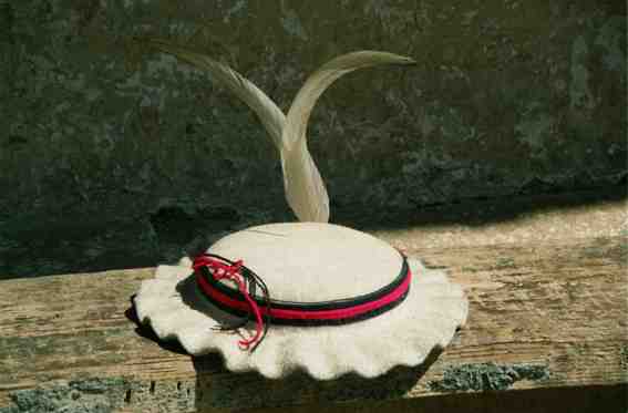 baima hat made from goat hair and cockerel feathers